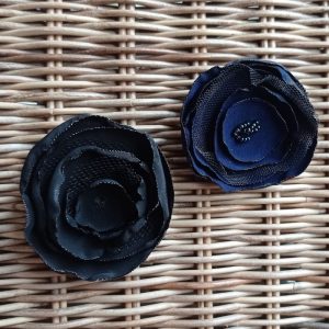 Flor tela niña pelo con pinzas azul