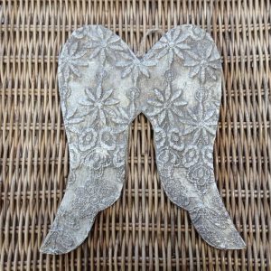 Alas de ángel relieve flores plata vieja