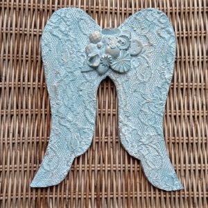 Alas de ángel tallada abalorios sol turquesa antiguo