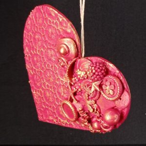 Corazón con abalorios con estrella de mar