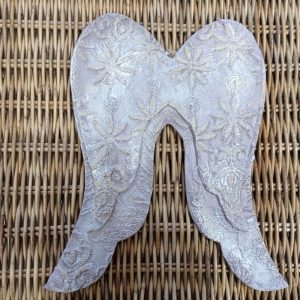 Alas de ángel relieve flores rosa antiguo