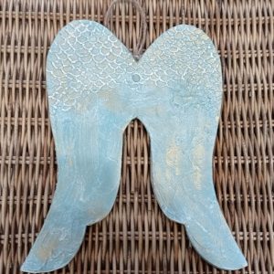 Alas de ángel tallada celeste antiguo