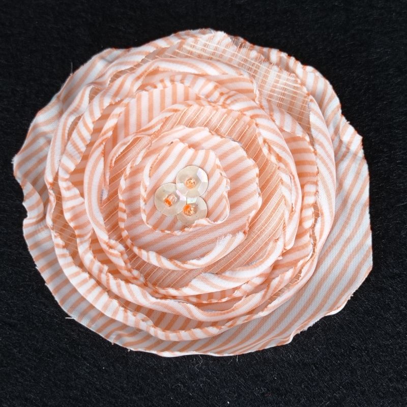 Flor tela rayas naranjas