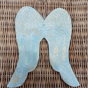 Alas de ángel tallada celeste antiguo